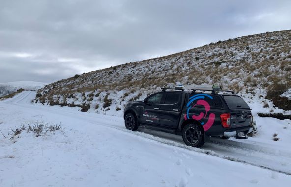 Kinetic Electrical Queenstown Vehicle on Snowy Mountain
