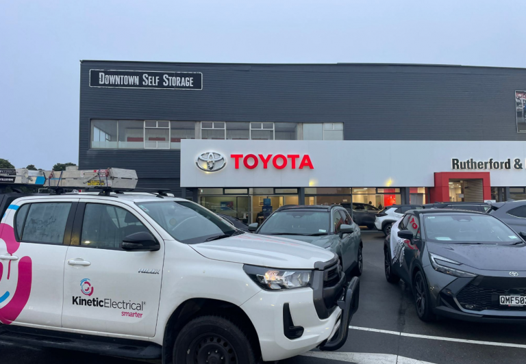 Kinetic Electrical Wellington vehicle and team onsite at a commercial property
