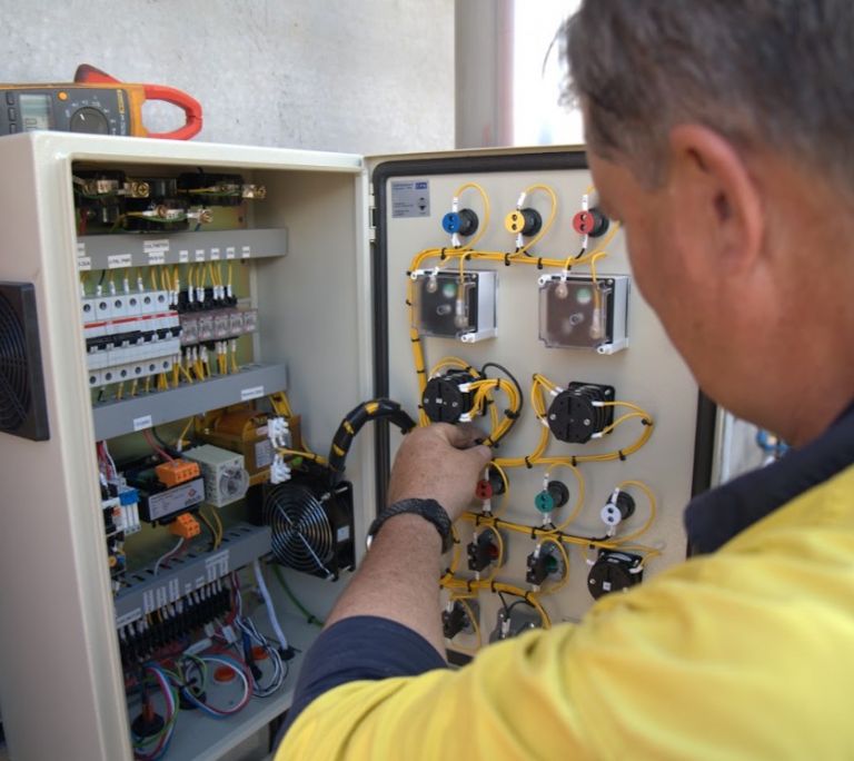 Kinetic Electrical technician working on board