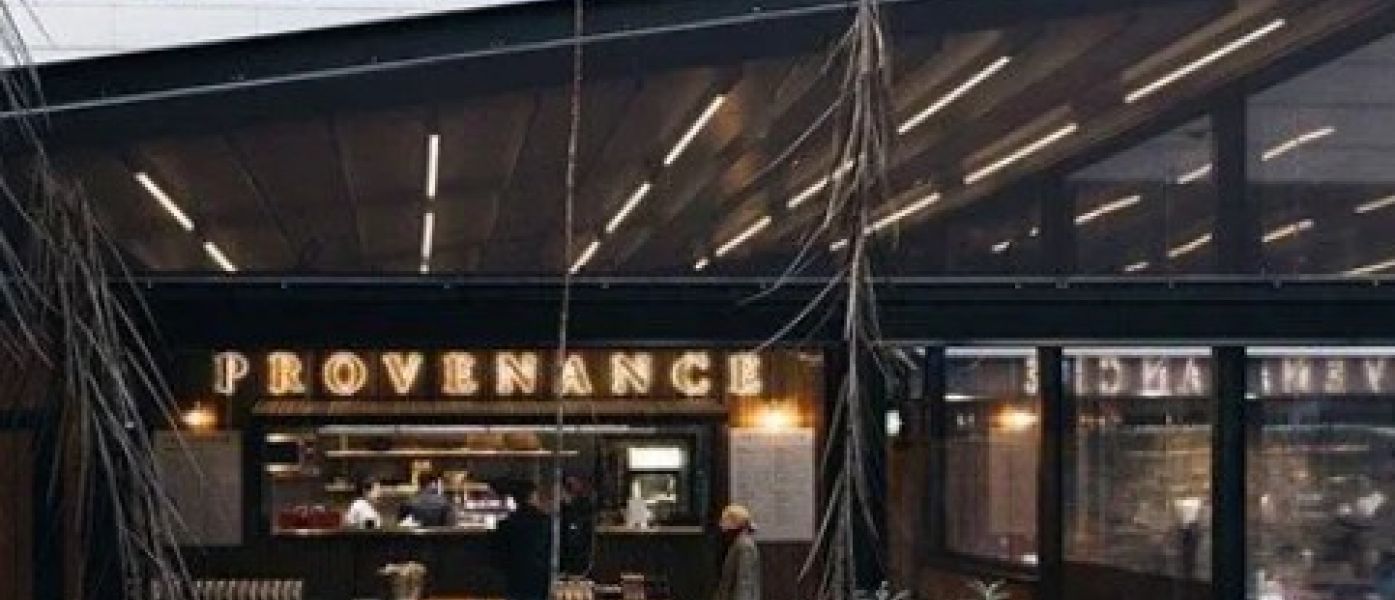 Exterior of Provenance Café courtyard at Queenstown Airport with the Remarkables behind it