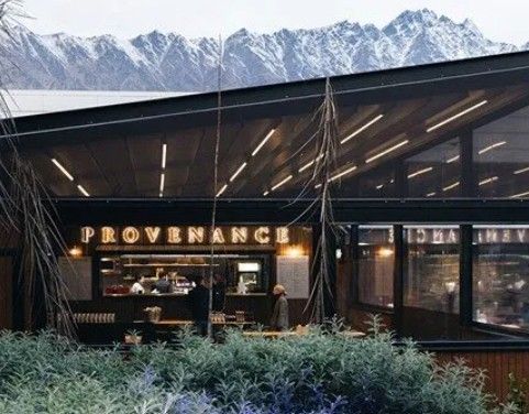 Exterior of Provenance Café courtyard at Queenstown Airport with the Remarkables behind it